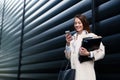 Attractive and beautiful businesswoman standing in office Royalty Free Stock Photo