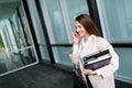 Attractive and beautiful businesswoman standing in office Royalty Free Stock Photo