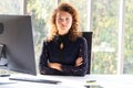 Attractive beautiful and confident business woman working with computer in the modern office or home Royalty Free Stock Photo