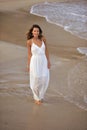 Attractive and beautiful woman enjoying vacation summer holidays at Spain coast village walking on beach Royalty Free Stock Photo