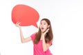 Attractive beautiful young asian woman smile and excited holding empty speech bubble isolated on white background Royalty Free Stock Photo