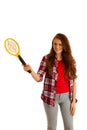 attractive Beautiful young woman holds electroc racket for kiling flys