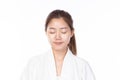 Attractive beauty young asian woman after washing face, cleaning her face on white background Royalty Free Stock Photo