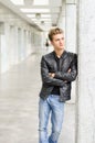 Attractive blond young man standing outside Royalty Free Stock Photo