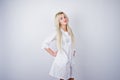 Attractive blonde female doctor or nurse in lab coat Royalty Free Stock Photo