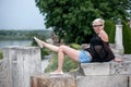 Attractive blonde on the fortress wall