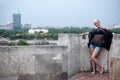 Attractive blonde on the fortress wall