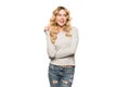 Attractive blonde happy woman standing in casual clothes,