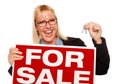 Attractive Blonde Holding Keys & For Sale Sign