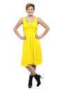 Attractive blonde wearing bright yellow frock Royalty Free Stock Photo