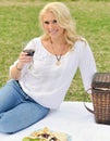 Attractive blonde woman picnic Royalty Free Stock Photo