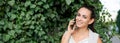 Attractive brunette businesswoman talking on mobile phone. Caucasian business Royalty Free Stock Photo