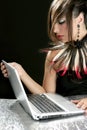 Attractive brunette fashion woman with laptop Royalty Free Stock Photo