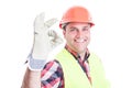 Attractive builder doing ok or perfect gesture Royalty Free Stock Photo