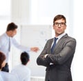 Attractive buisnessman or teacher in glasses