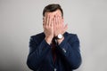 Attractive business man covering eyes like blind gesture Royalty Free Stock Photo