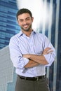 Attractive business man posing happy in corporate portrait outdoors on financial district Royalty Free Stock Photo