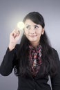 Attractive Business woman holding a light bulb Royalty Free Stock Photo