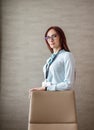 Attractive business woman wearing spectacles and blank badge at office Royalty Free Stock Photo