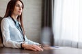 Attractive business woman wearing spectacles and blank badge at office Royalty Free Stock Photo