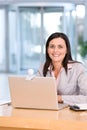 Attractive business woman working on laptop Royalty Free Stock Photo