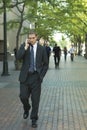 Attractive Businessman on Cell Phone Downtown