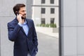 Attractive businessman is communicating on the telephone Royalty Free Stock Photo