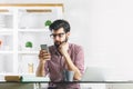 Attractive businessman using cellular phone Royalty Free Stock Photo