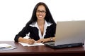 Attractive businesswoman at her desk Royalty Free Stock Photo