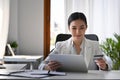 Businesswoman holding credit card and making banking online with digital tablet. Royalty Free Stock Photo