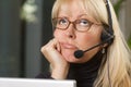 Attractive Businesswoman with Phone Headset