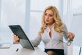 attractive businesswoman reading documents