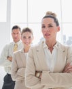 Attractive businesswoman standing with arms crossed Royalty Free Stock Photo