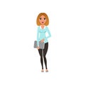 Attractive businesswoman standing with paper folder Royalty Free Stock Photo