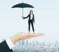 Attractive businesswoman with umbrella