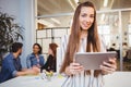 Attractive businesswoman using digital tablet in meeting room Royalty Free Stock Photo