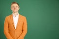 Attractive caucasian adult male wearing orange jacket