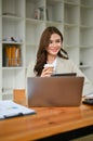 Attractive caucasian businesswoman in business suit is in the meeting with her team Royalty Free Stock Photo