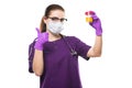 Attractive caucasian female doctor holding urine sample in her hands in medical mask and sterile gloves with thumb up on Royalty Free Stock Photo