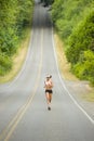 Attractive Caucasian Female Runner on Country Road