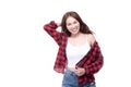 Attractive charming young casual woman red lips wearing jeans skirt and red plaid shirt standing posing isolated on white Royalty Free Stock Photo