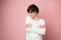 Attractive cheerful caucasian girl with shot dark hair isolated over pink  background. Young beautiful woman Royalty Free Stock Photo