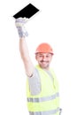 Attractive cheerful engineer rising up modern tablet