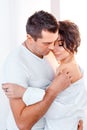 Attractive cheerful man and woman hugging. couple cuddling, love and romence concept