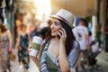 Attractive city hipster woman walking in the street Royalty Free Stock Photo