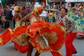 Attractive Colombian dancers waving motley skirts street performance Royalty Free Stock Photo