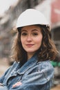 Attractive construction manager posing with folded arms Royalty Free Stock Photo