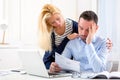 Attractive couple doing administrative paperwork Royalty Free Stock Photo