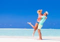 Attractive couple enjoying sunny day at Cayo Largo beach, Cuba