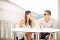 Attractive couple having first date.Blind date.Coffee with a friend.Smiling happy people having a coffee,dating Royalty Free Stock Photo